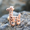 Piercing cartilage dor� � giraffe