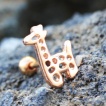 Piercing cartilage dor� � giraffe