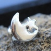Piercing cartilage � lune et �toile en acier