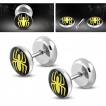 Piercing faux plug acier � araign�e jaune sur fond noir