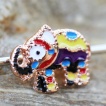 Piercing industriel � �l�phant cuivr� �maill� multicolore