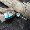 Piercing nombril cadenas � oeil de chat bleu ciel avec strass