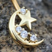 Piercing nombril doré à croissant de lune serti et étoile