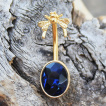 Piercing nombril dor� � papillon et pierre bleu saphir