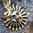 Piercing nombril doré à soleil, lune et étoile