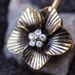 Piercing nombril plaqué or fleur exotique vintage avec strass