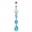 Piercing nombril � trio de gouttes de turquoise et �toile strass
