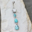 Piercing nombril � trio de gouttes de turquoise et �toile strass