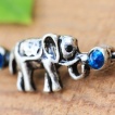 Piercing oreille industriel �l�phant et pierres bleues