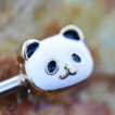 Piercing téton duo de pandas