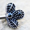 Piercing t�ton � plumes de paon vintages