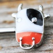 Piercing téton vache noire et blanche à anneau