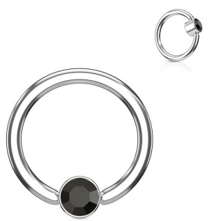 Anneau � cylindre captif serti d'un cristal noir