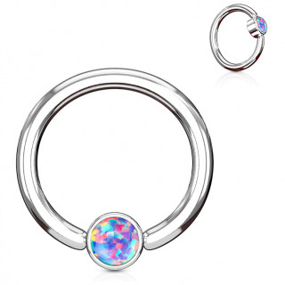 Anneau � cylindre captif serti d'une opale violette