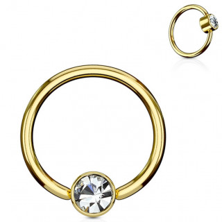 Anneau dor� � cylindre captif serti d'un cristal