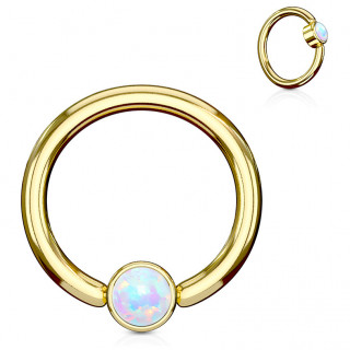 Anneau dor� � cylindre captif serti d'une opale blanche