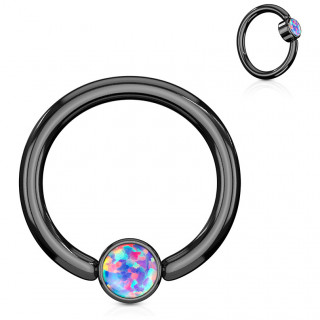 Anneau noir � cylindre captif serti d'une opale violette