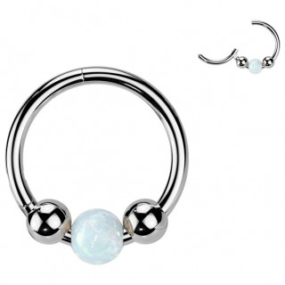 Anneau Titane � trio de perles dont une d'Opale