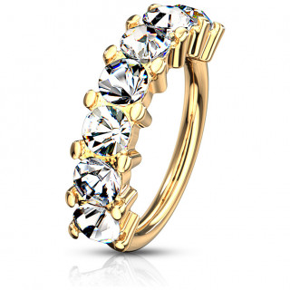 Anneau tordable en acier Dor� serti de 7 cristaux