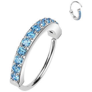 Anneau tordable � ligne de zirconiums bleus (narine, oreille....)