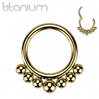 Anneau segment en Titane dor� � billes asym�triques
