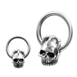 Piercing anneau captif � t�te de mort et griffes