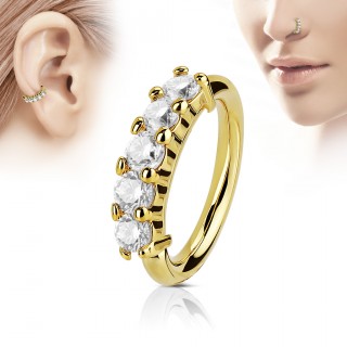 Piercing anneau dor� couronne de pierres claires