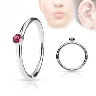 Piercing anneau ouvert en acier � cristal rose
