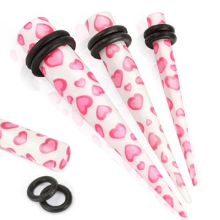 Piercing �carteur blanc � coeurs roses type tapers