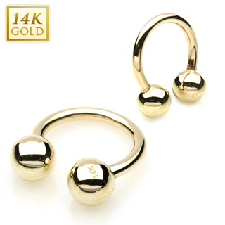 Piercing fer � cheval � boules en or jaune 14 carats