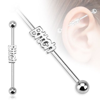 Piercing industriel avec mot "Bitch" en relief