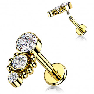 Piercing labret Dor� � trio de zirconiums asym�triques bord�s de perles