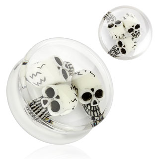 Piercing plug transparent renfermant des t�tes de morts